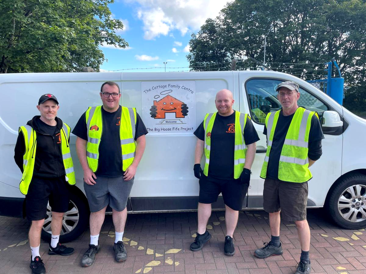 Photo of The Big House Warehouse Team in front of a van